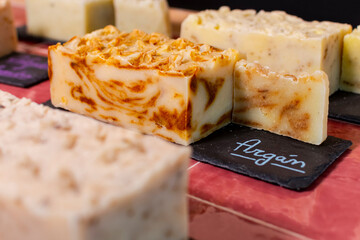 Eco friendly recycled colorful handmade soap by weight in small store zero waste by weight, close up view