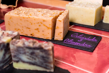 Eco friendly recycled colorful handmade soap by weight in small store zero waste by weight, close up view