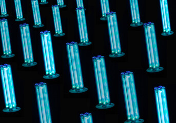 ULTRAVIOLET LAMPS IN THE DARK . UV Lamps Light in full screen. UV disinfection lamps.