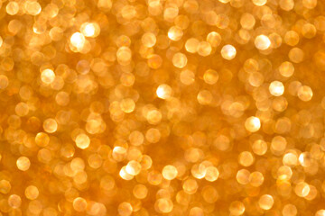 yellow sparkle glitter background. Holiday abstract defocused background.