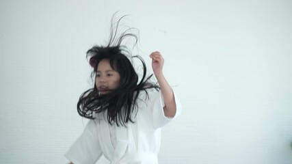 Mother-Daughter Bonding: Asian Family Enjoying Hair Styling Time at Home, Celebrating Women's Empowerment and Maternal Home Activities