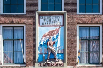 Foto op Canvas Memorial stone Watergeuzen (1872)  on facade of house in Voorstraat in Den Briel, Zuid-Holland province, The Netherlands © Holland-PhotostockNL