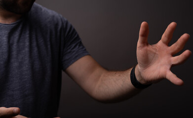man showing his empty hand.