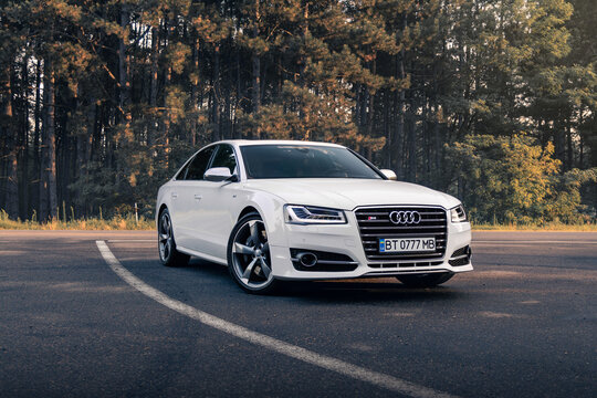 White Audi S8 D4 on the forest road. Kherson, Ukraine - August 2021.