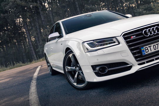 White Audi S8 D4 on the forest road. Kherson, Ukraine - August 2021.