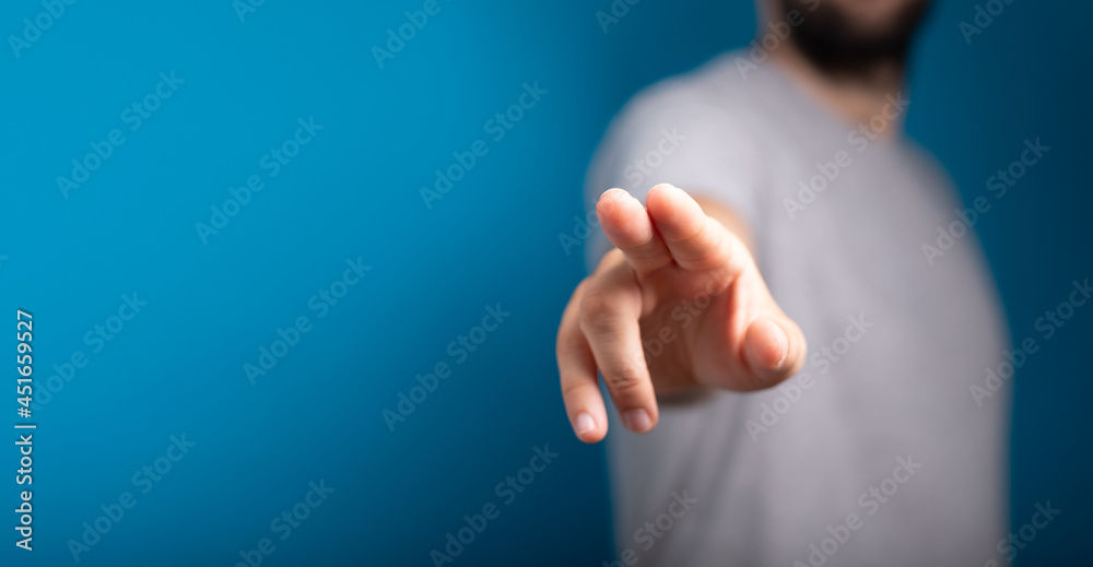 Poster Businessman pointing or touching finger in screen..
