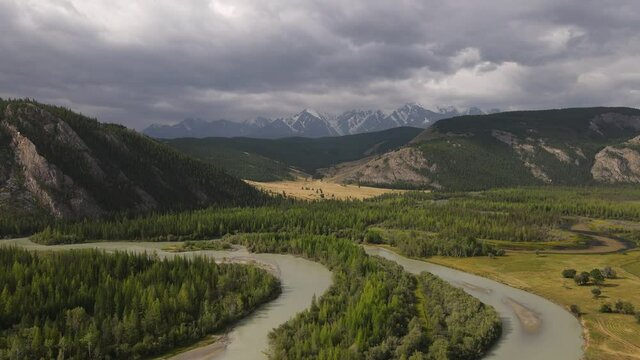 Flight on the Chuya River. Wonderful landscape with the Chuya river, forest, hills and&nbsp;Chuya&nbsp;Ridge. Altai Mountains, Russia.