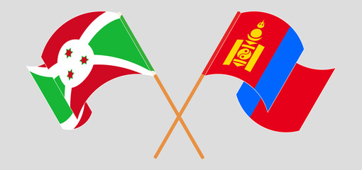 Crossed and waving flags of Burundi and Mongolia