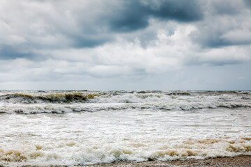 Storm clouds over the sea. Dramatic sky and giant waves