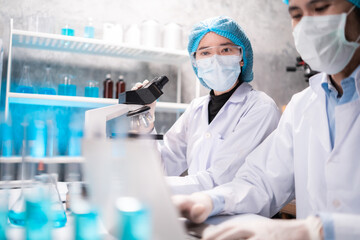 Health care researchers working in life science laboratory, medical science technology research work for test a vaccine, coronavirus covid-19 vaccine protection cure treatment