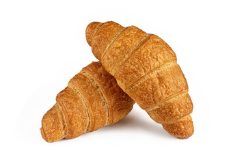Croissants with a golden crust on a white table surface