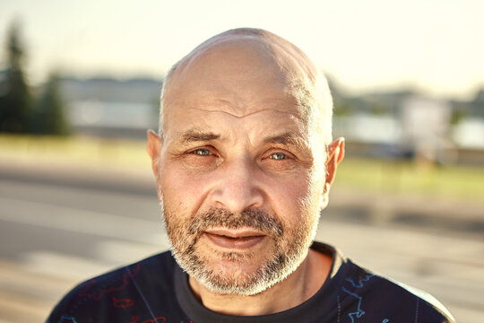 Portrait Of Caucasian Middle Age Man 60 Years Old Outdoors.