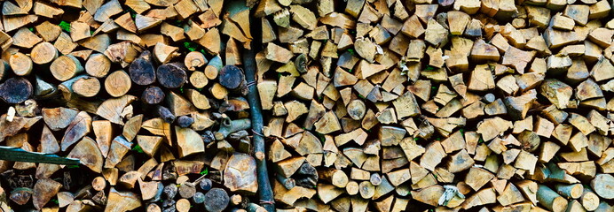 A pile of firewood - obrazy, fototapety, plakaty