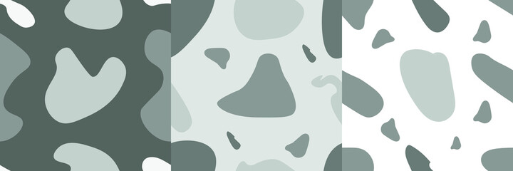 A set of three isolated abstract patterns with random spots in a grey color scheme. Vector illustration in modern style. Stamp texture, wallpaper collection. minimalist art.