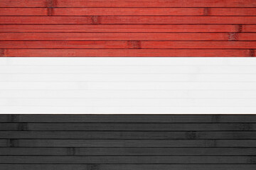 Yemeni tricolor flag.
