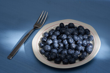 Blueberries on a wooden board