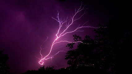 Thunderstorm. Lightning in the purple sky