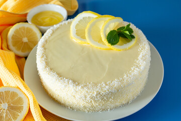 Delicious biscuit dessert with lemon and coconut, homemade birthday cake.