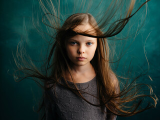 girl with closed eyes and loose hair close up isolated background