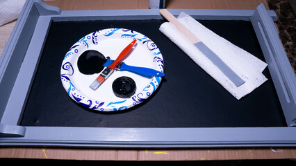 Painting a chalkboard sign