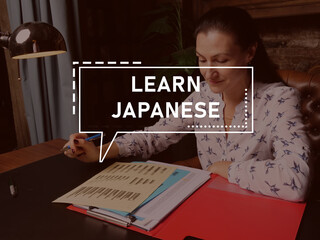  LEARN JAPANESE text in block of quotes. Manager doing paperwork