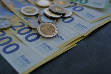 Euro bills and coins.Money.Finance and savings. 200 euro banknotes. Finance and savings. Cash. High quality photo