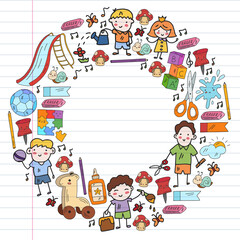 Fototapeta premium Children play with toys in the kindergarten. Kids playground. Education, creativity, imagination.