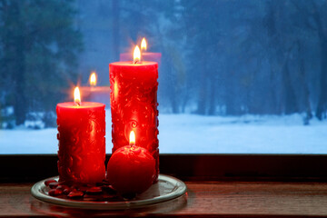 Christmas Candles On The Window Sill - 451702762