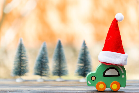 Christmas red jat on wood toy car . Christmas holiday celebration concept.