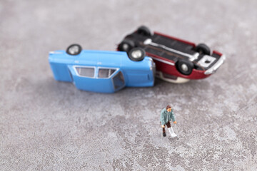 Fototapeta premium Injured leg after car accident in miniature scene