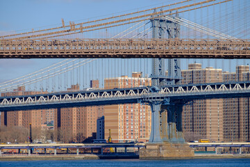 The Brooklyn Bridge and the Manhattan bridge spanning the East River from Brooklyn into Lower...