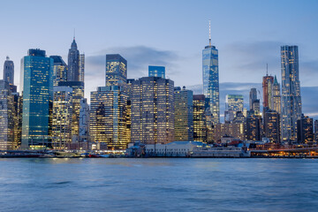 Fototapeta na wymiar The lower Manhattan New York City skyline at twilight dusk as seen from the East river