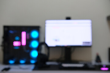Blurred working station with personal computer on it