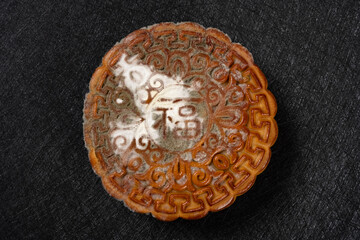 English translation of the Chinese-fortune-top view badly moldy moon cake