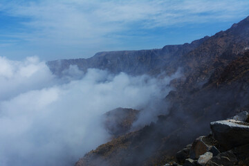 Fototapeta na wymiar Mountain ridge in the clouds