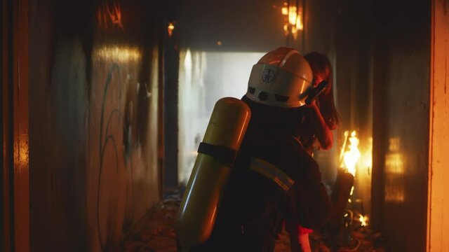 Firemen saving kid from fire