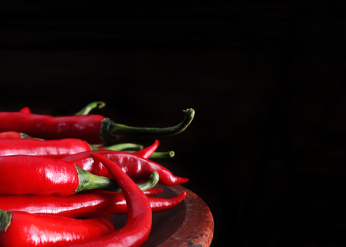 red hot chili peppers on a dark background