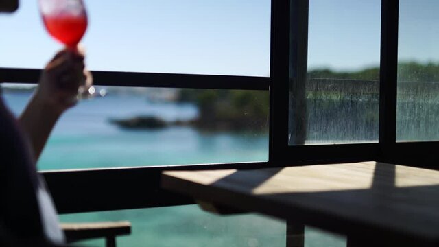 Chilling with red wine cocktail at a luxury resort club Mallorca