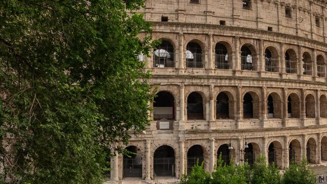 hyperlapse of the side of Colosseum in Rome. Amazing architecture centrals details from the left side of this big oval amphitheatre in the centre of the city of Rome, Italy. Colosseo, Roma