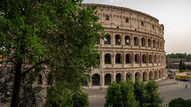 hyperlapse of the side of Colosseum in Rome. Amazing architecture details from the left side of this big oval amphitheatre in the centre of the city of Rome, Italy. Colosseo, Roma