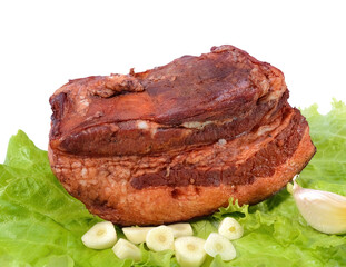 Pork fat.A piece of homemade boiled brisket with meat layers is isolated on a white background.