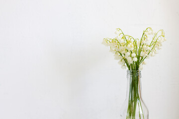lilies of the valley on a white background. flowers for flower shop design. sign for congratulations.