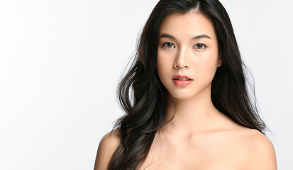 Fototapeta premium Beautiful young asian woman with clean fresh skin on white background, Face care, Facial treatment, Cosmetology, beauty and spa, Asian women portrait.
