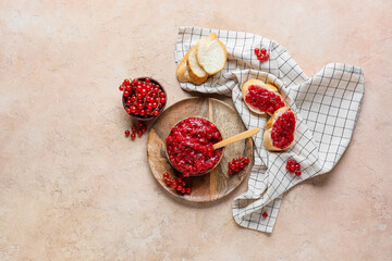 Composition with red currant jam, berries and sandwiches on color background