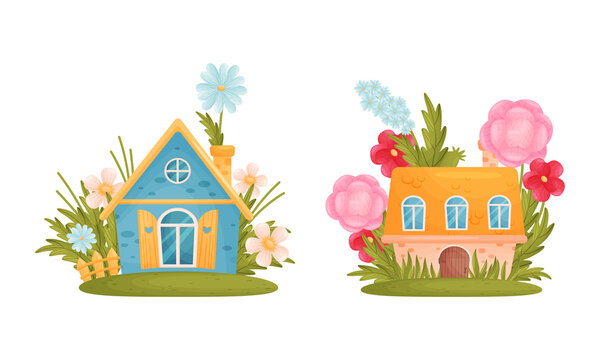 Cute small houses among summer flowers cartoon vector illustration on white background