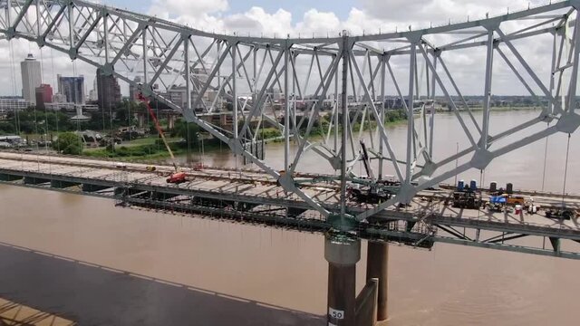 PANNING DRONE SHOT OF CONSTRUCTION WORK ON HERNANDO DE SOTO BRIDGE