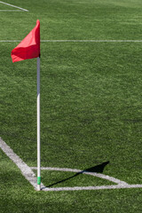 Fototapeta premium Flag on the corner of the football field.