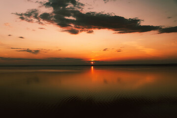 Fototapeta na wymiar Amazing landscape at sunset. Colorful sunrise on the ocean or sea beach. Colorful nature sea sky