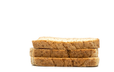 Isolated stack of three whole wheat bread on white background. Close-up image, side view of bread.