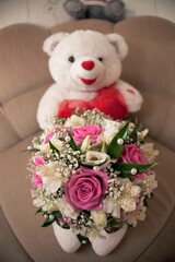teddy bear with roses